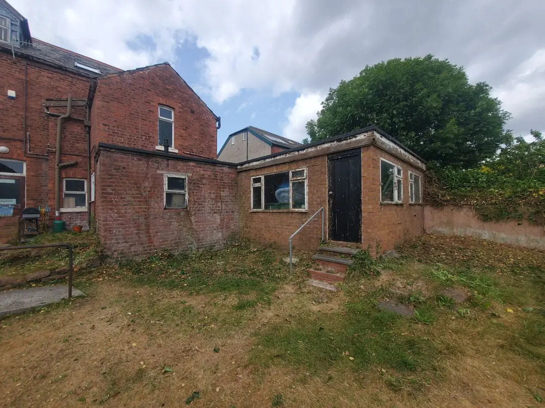 Outbuilding in West Kirby cleared of lilac and ivy